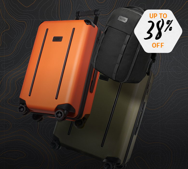Two suitcases with a sale tag for 38% off.