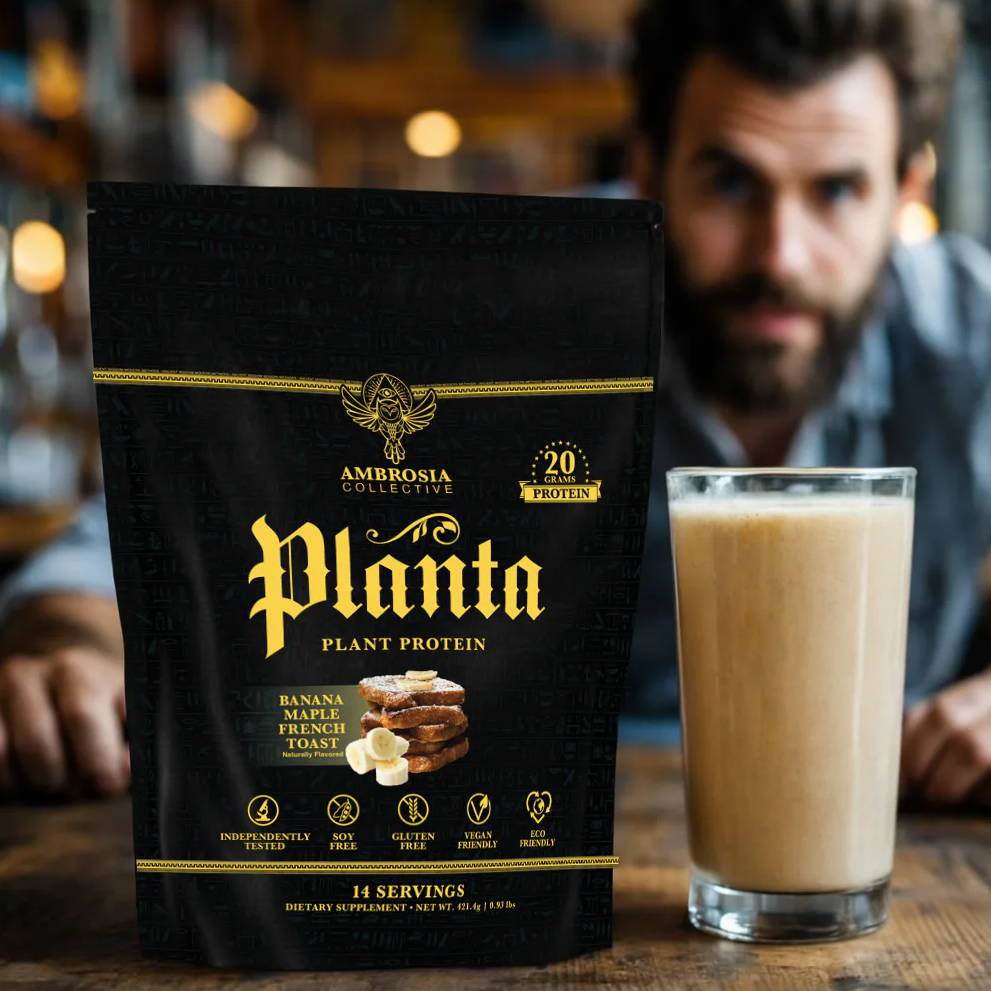 A man behind a glass of plant protein drink and a product bag.