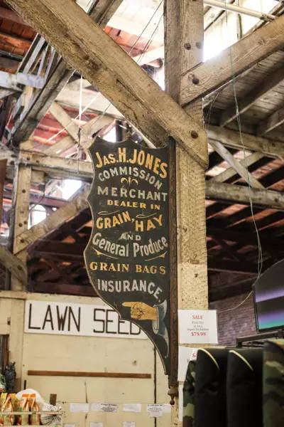 Old sign in barn shop.
