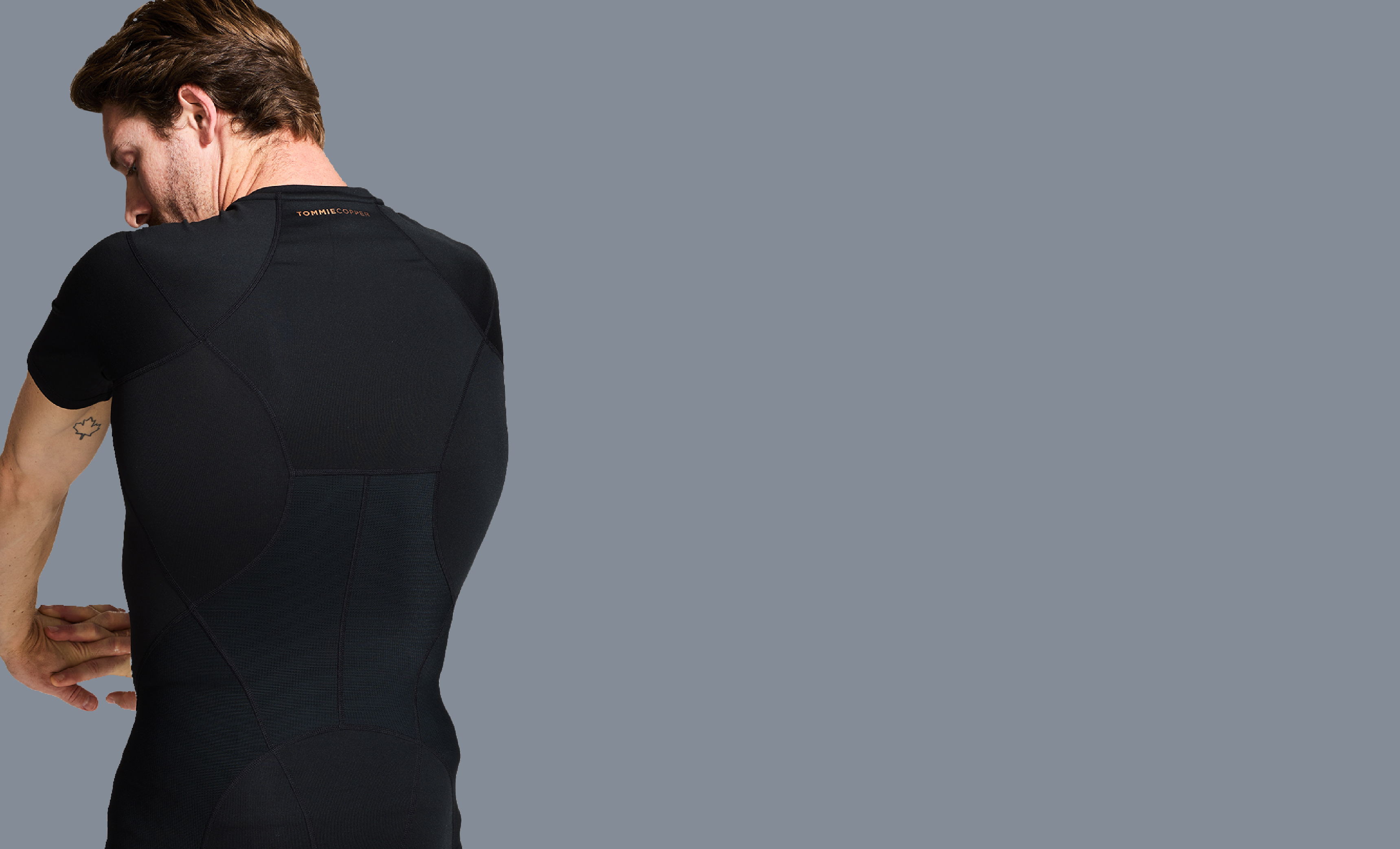 Man wearing the Full Back Support Shirt