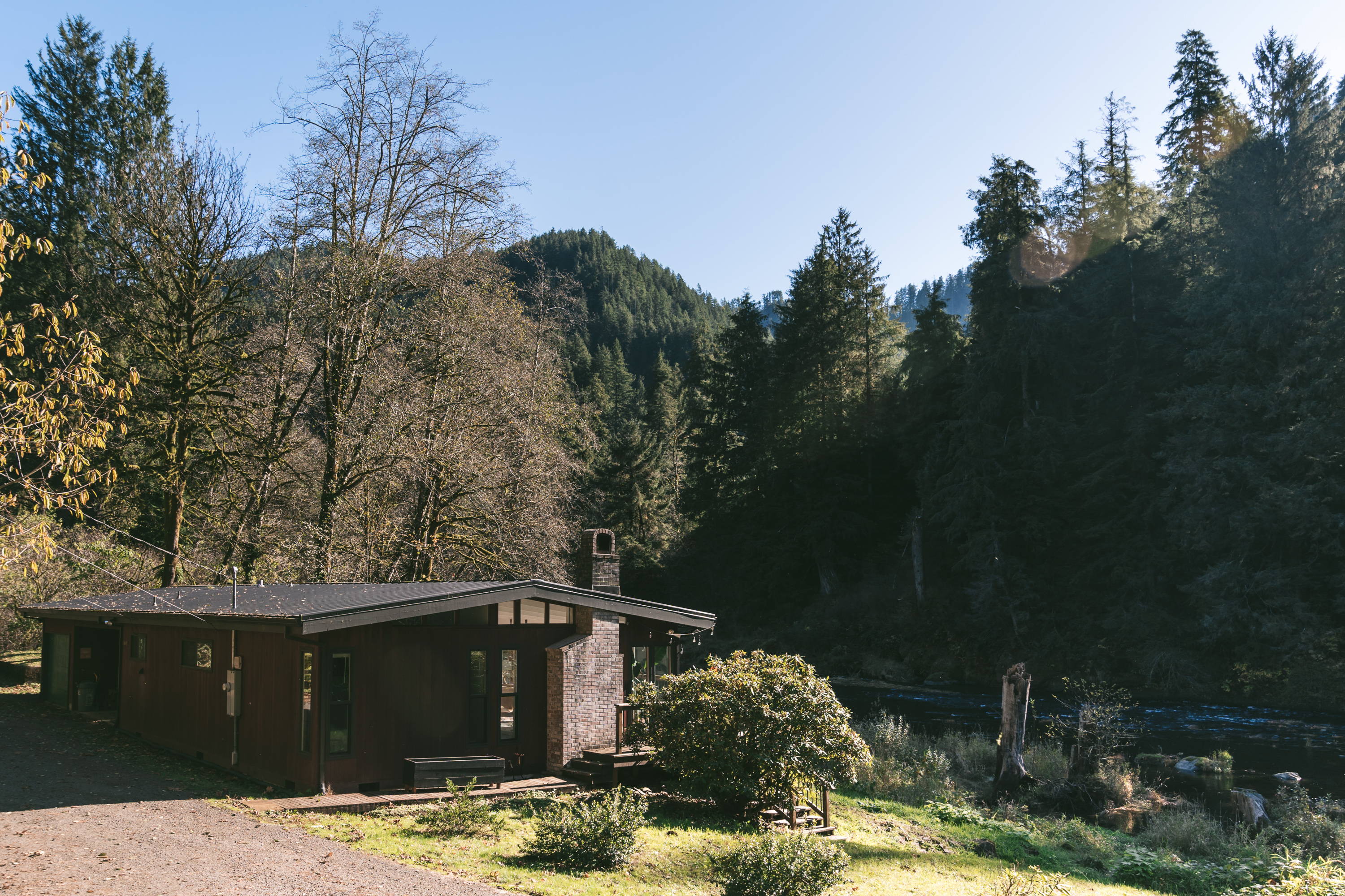 Renovated mid-century cabin on Tillamook River in woods