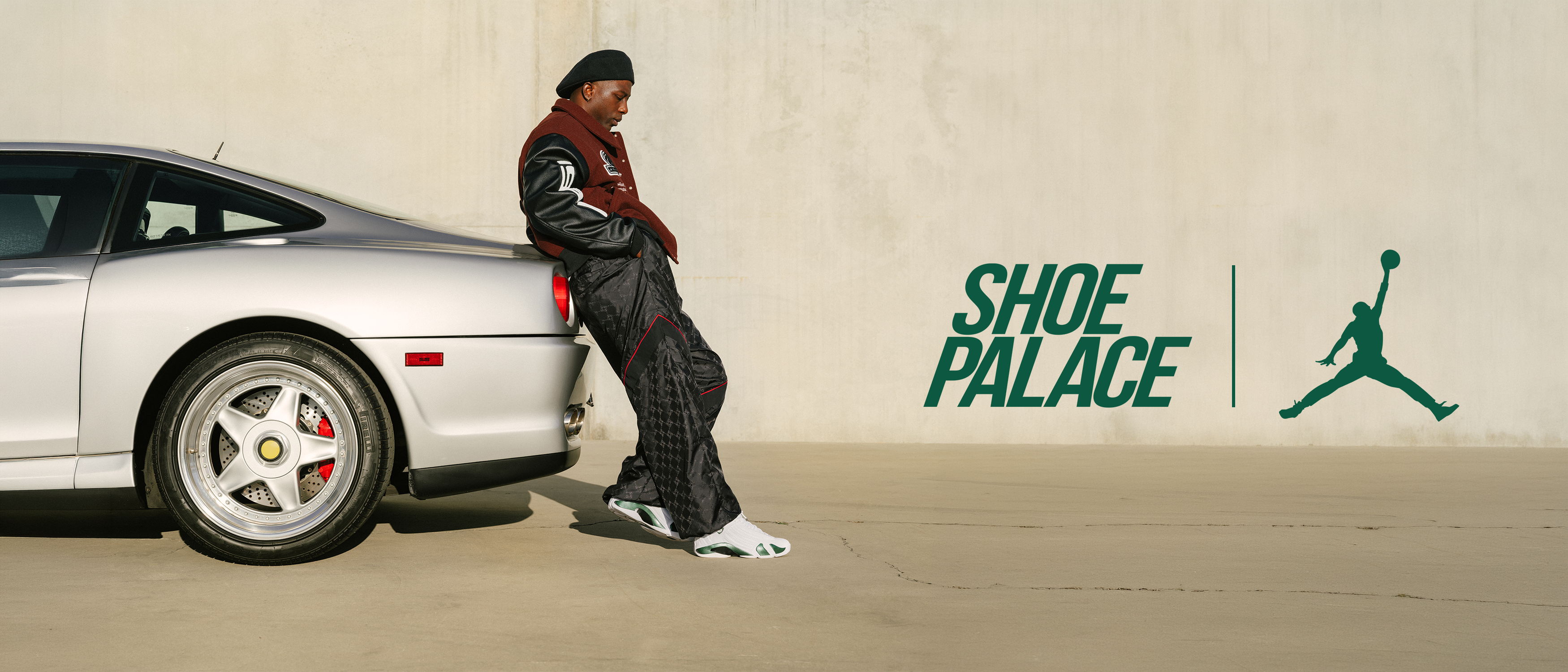 Person in athletic wear beside a silver car, featuring Shoe Palace and Air Jordan logos.