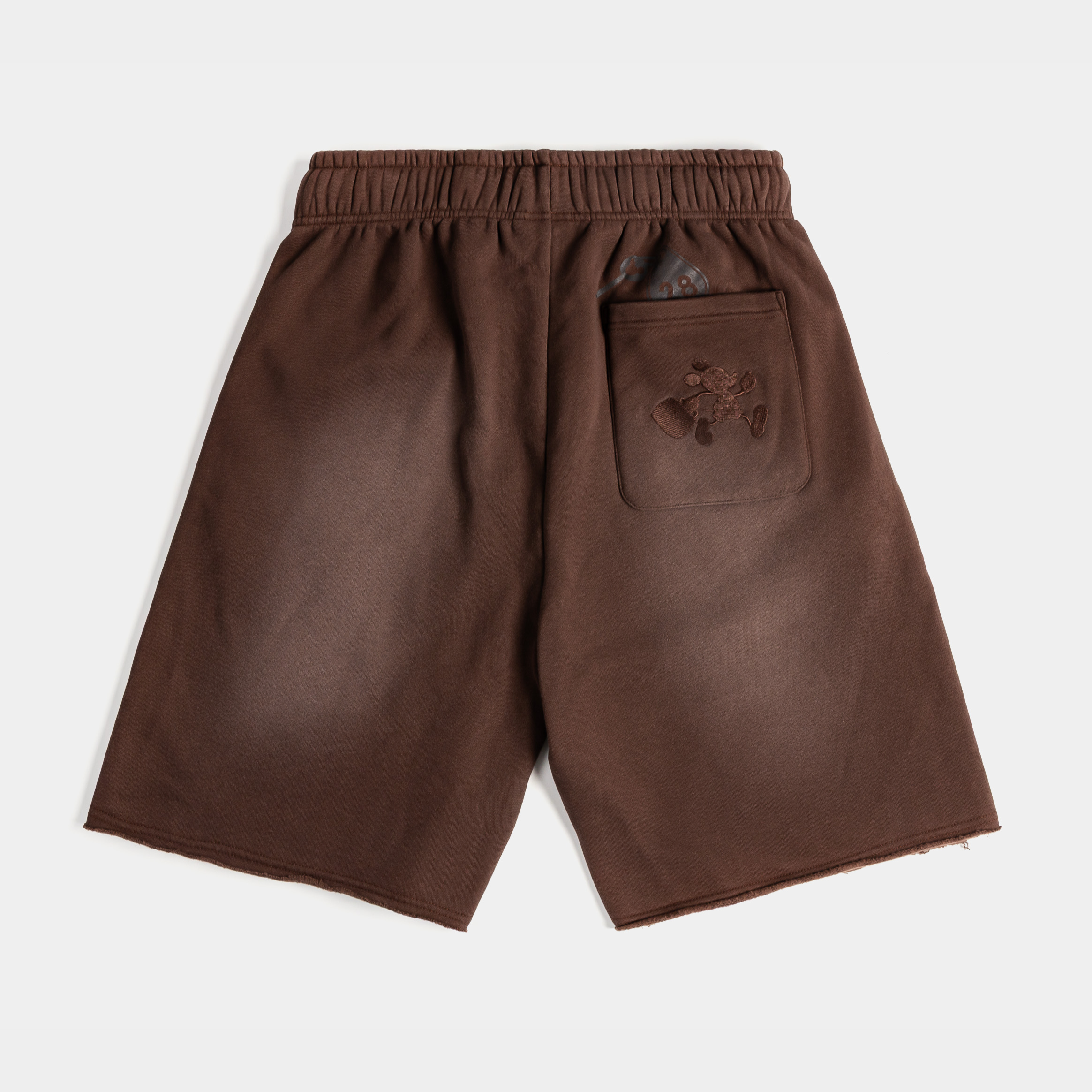 Brown shorts with pockets and drawstring.