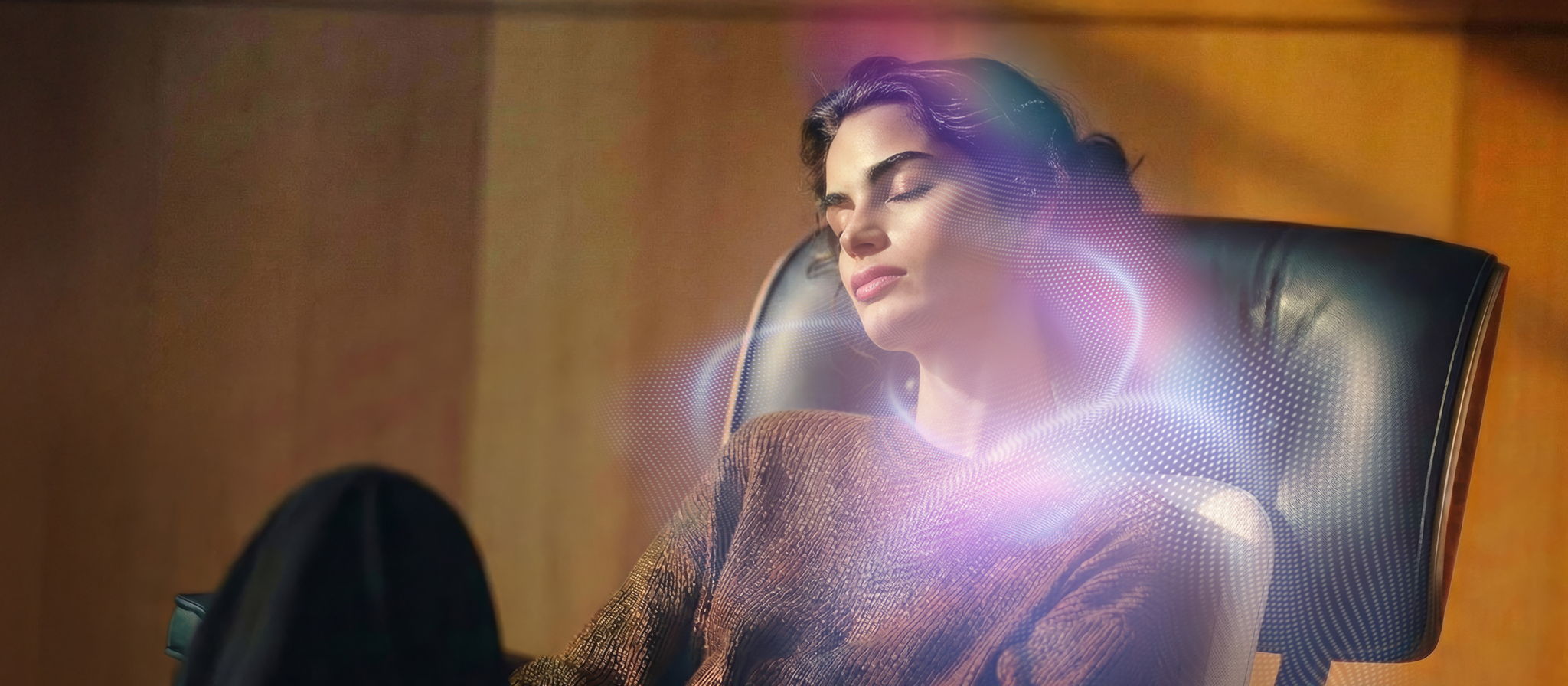 Woman experiencing vibroacoustic massage