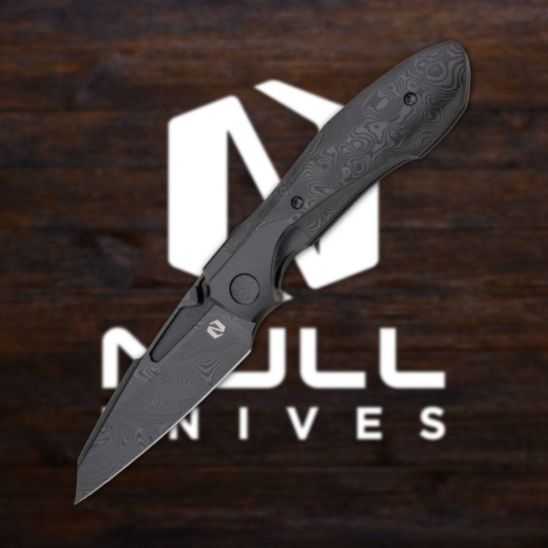 A folding knife displayed in front of the Null Knives logo.