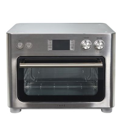 A stainless steel countertop oven with a glass door and control panel.