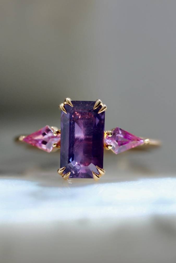 Purple Emerald Cut Sapphire Ring With Double Claw Prongs and Pink Kite Side Stones