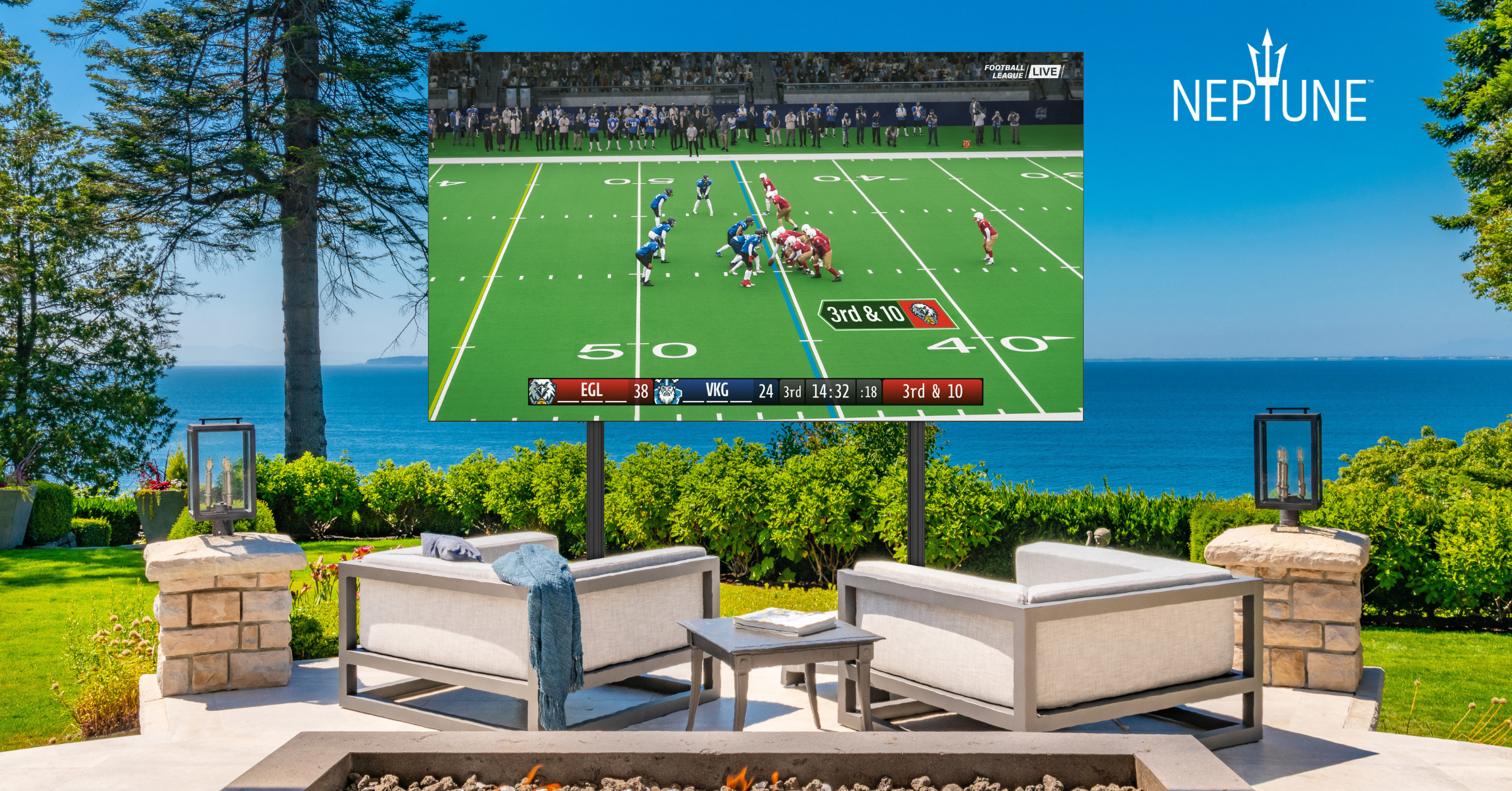 Outdoor seating area with a large screen displaying a football game.