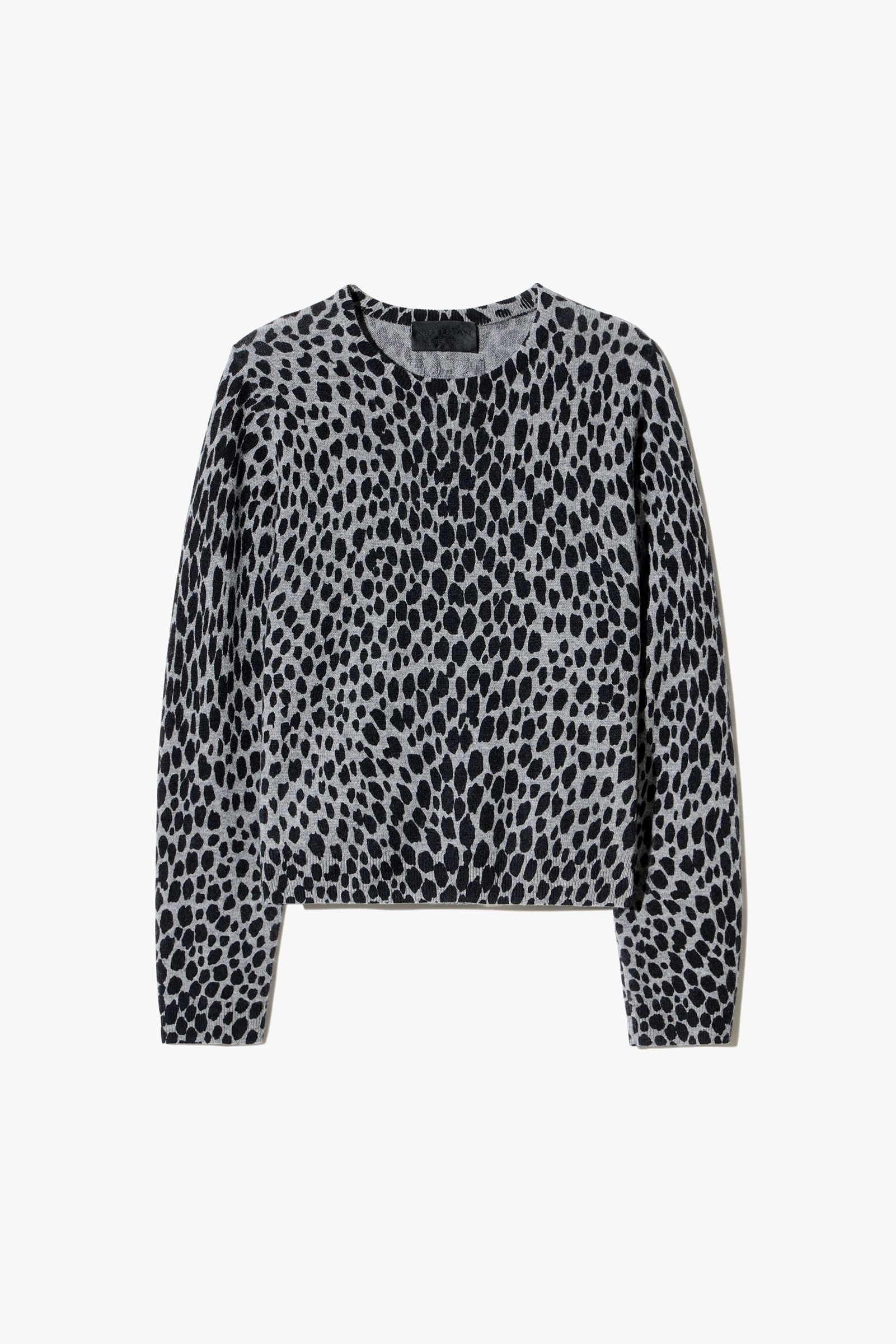 Leopard print long-sleeve sweater on a white background.