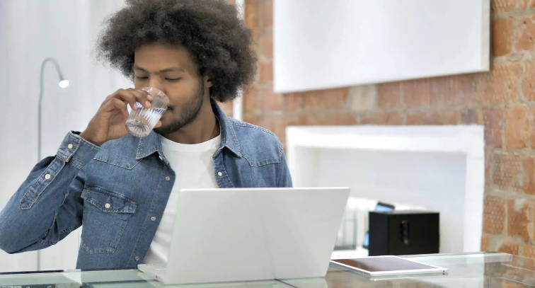 People drinking filtered water