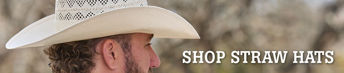 A person wearing a straw hat with text 