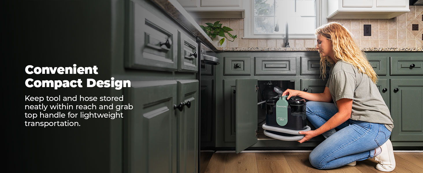 Woman organizing under a kitchen sink with compact storage solutions.