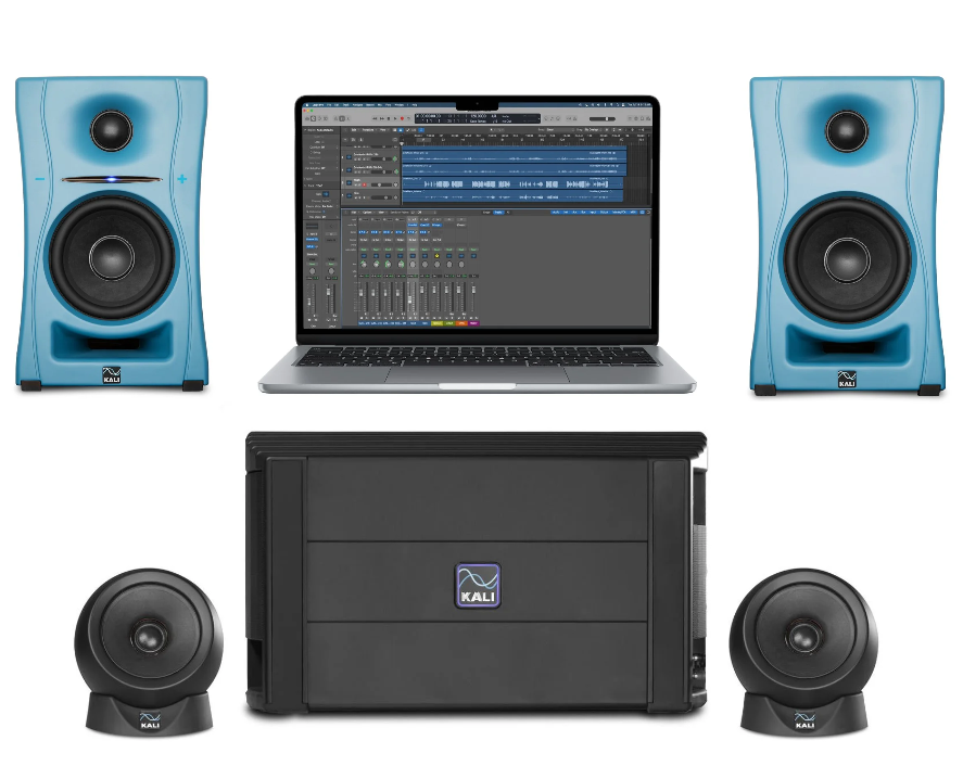 Computer with audio software and blue studio monitors, surrounded by speakers.