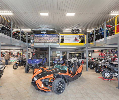 Cogan mezzanine installed in auto dealership to hold motorcycles, atvs and other vehicles.