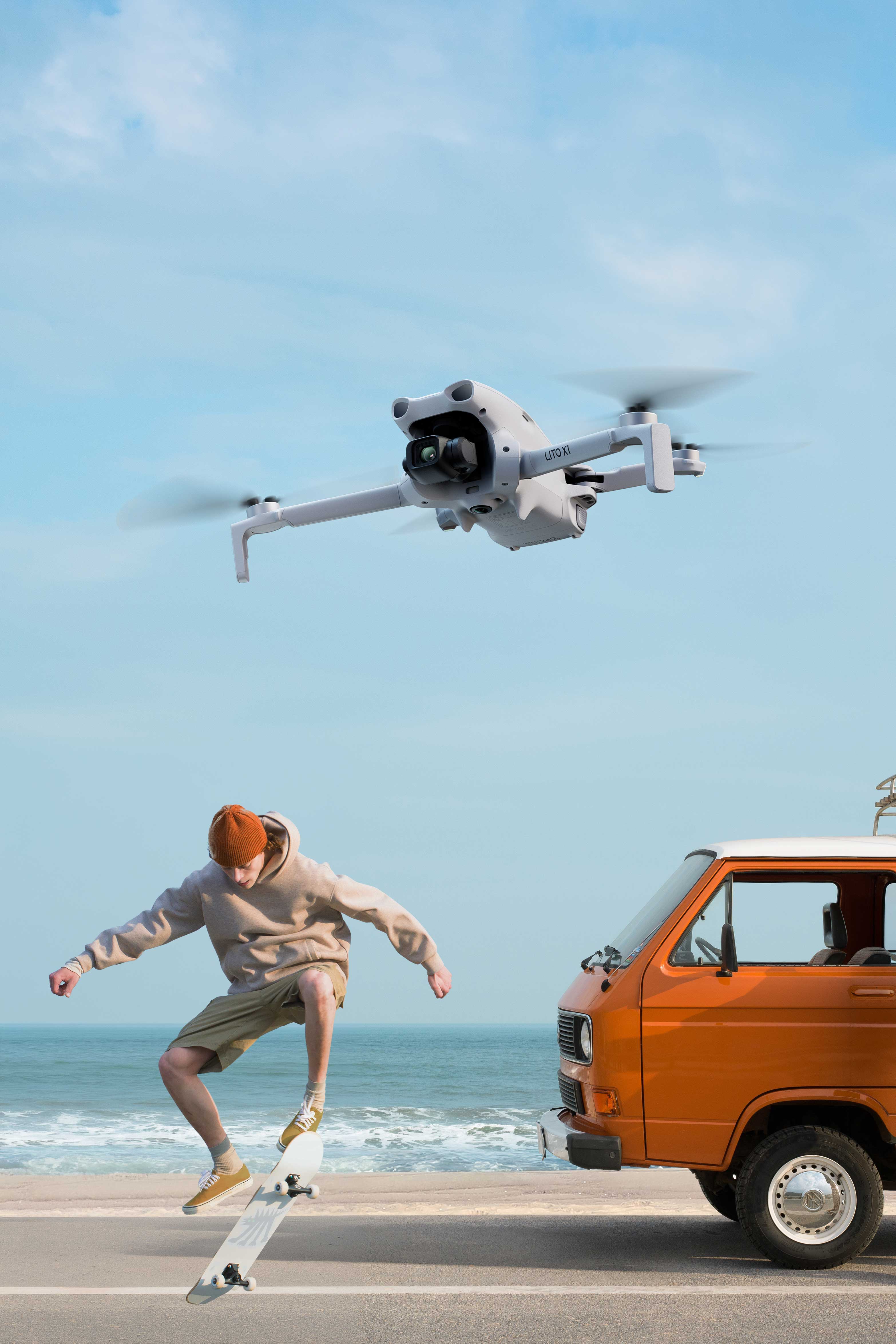 A skateboarder jumps while a drone flies overhead near a van.