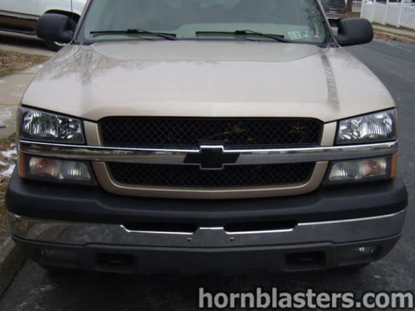 Front close-up Joe's Silverado grille headlights and chrome bumper photo 2