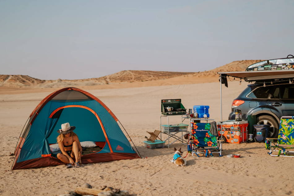 woman camping wearing waterproof sandals in the USA