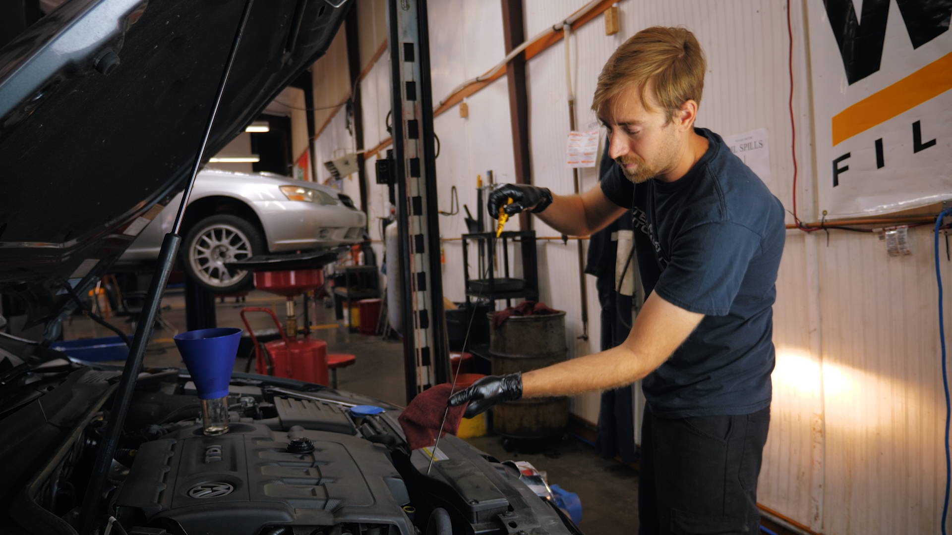 Oil Change - Checking Dipstick on Volkswagon