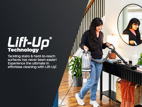 Person vacuuming with Lift-Up Technology in a home setting.