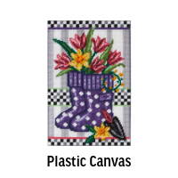 Plastic Canvas. Image: Herrschners Planting Season Porch Flag Plastic Canvas Kit.