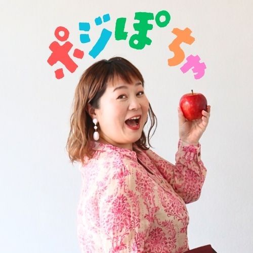 A woman holding an apple, smiling, with colorful text above.