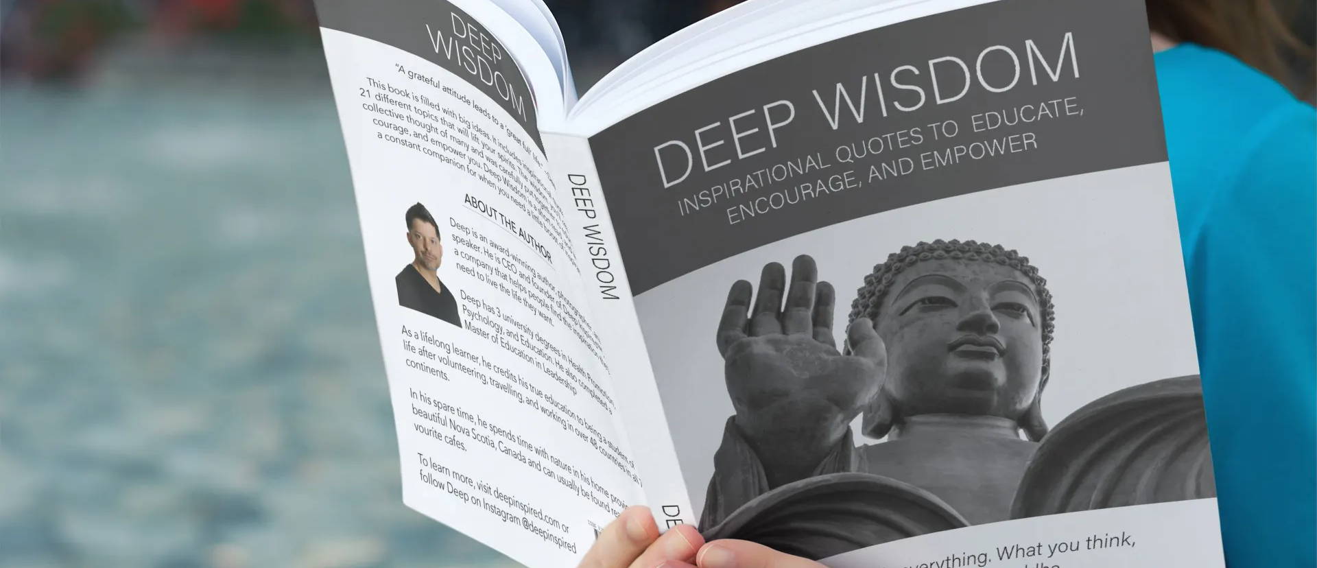 Woman holding paperback with Buddha on cover and title Deep Wisdom