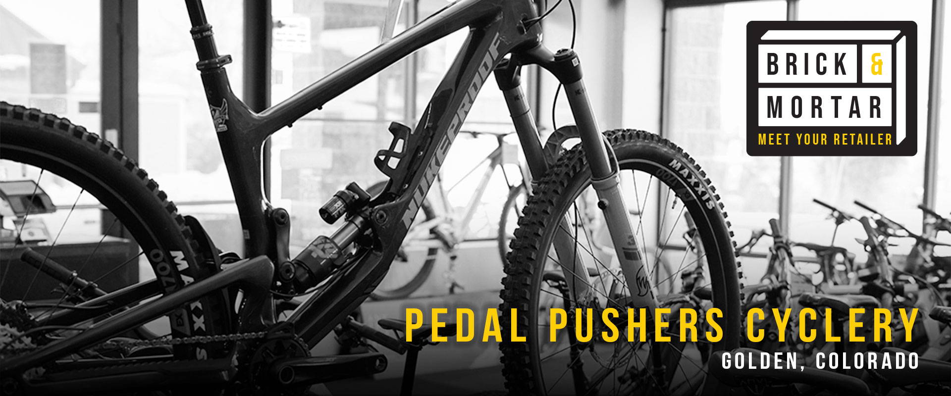A Nukeproof Mega mountain bike inside Pedal Pushers Cyclery