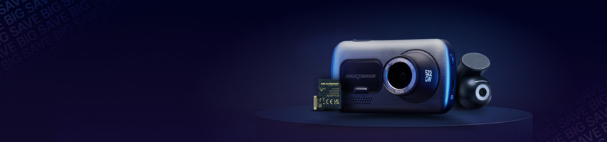 A camera,module and memory card on a dark background.