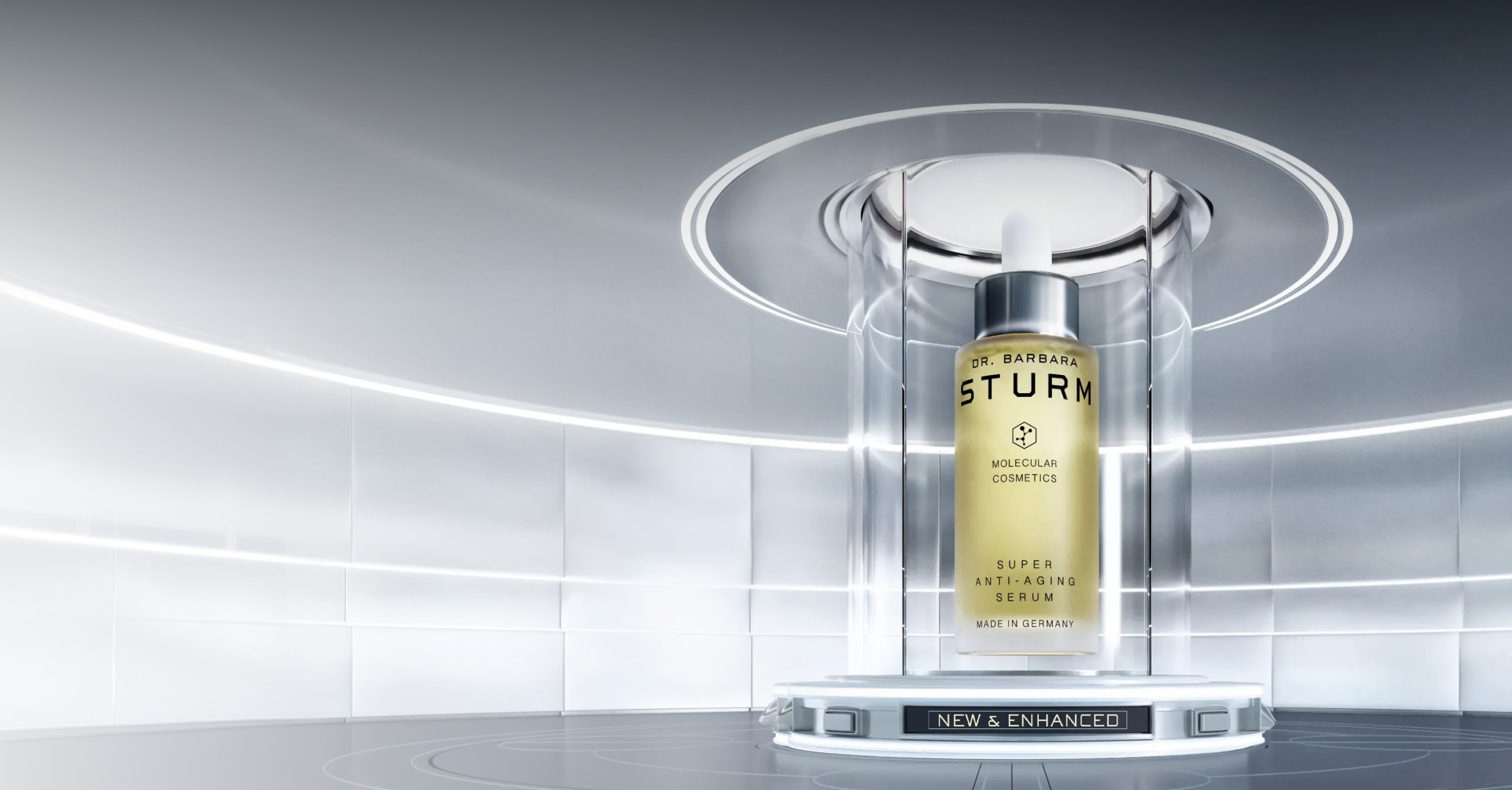 A luxury perfume bottle displayed in a modern glass case.