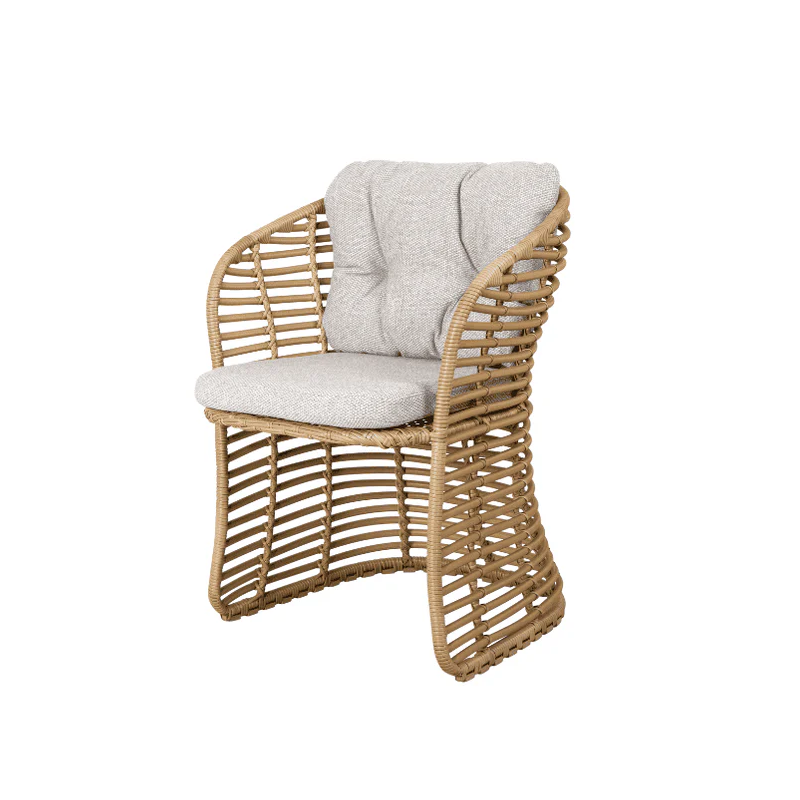 A woven dining chair that has a robust frame and flexible resin wicker.
