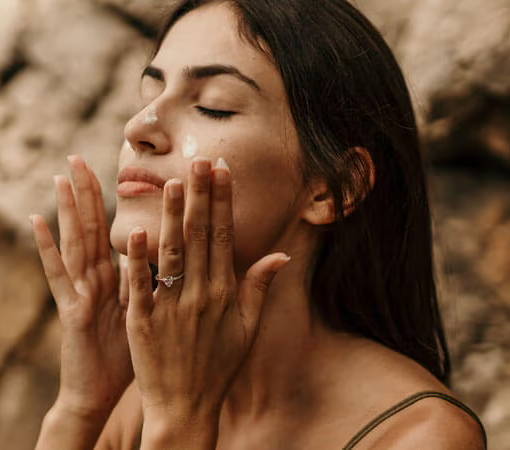 Applying mineral sunscreen in natural sunlight