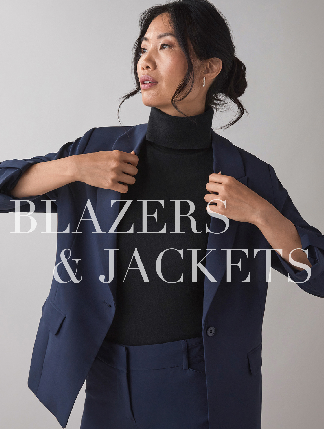 Woman in a blazer, promoting blazers and jackets.