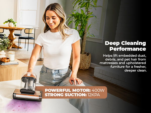 Woman using a mattress cleaner for deep cleaning performance in a living room.