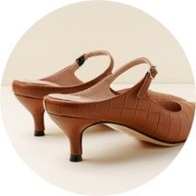 Brown heeled sandals with a strap and open toe.