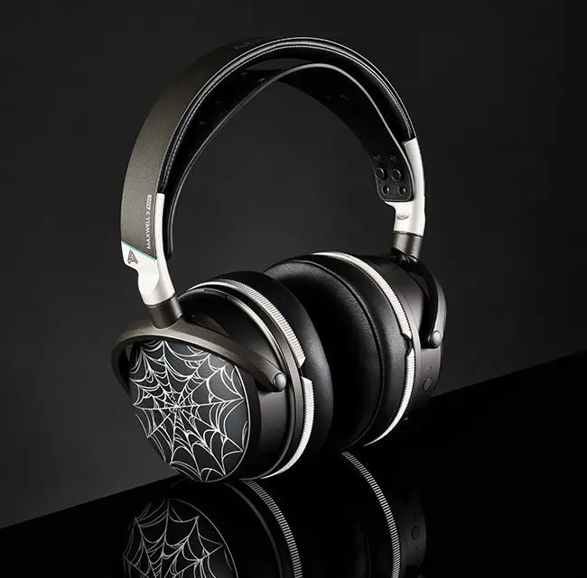 ReSkin cup on a Maxwell 2 in three-quarters view with a spider web design on one ear cup.