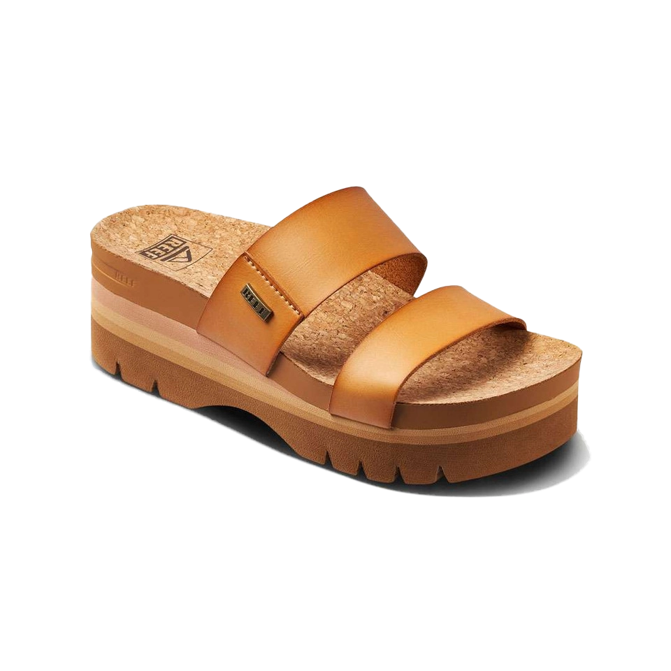Brown platform sandals with two straps and a cork footbed.