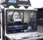 HornBlasters compressor and air tank inside diamond-plate toolbox in Cristian's truck bed photo 4