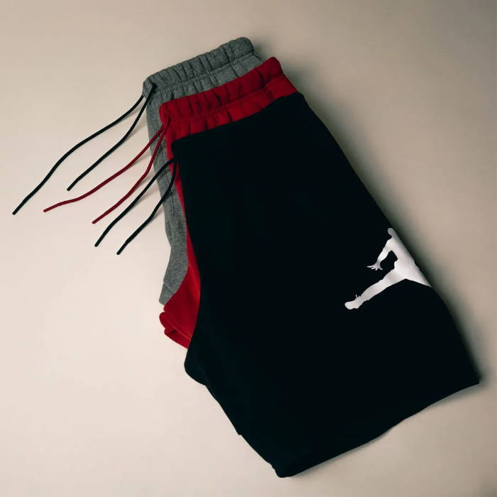 grey, red, and black jordan brand fleece shorts