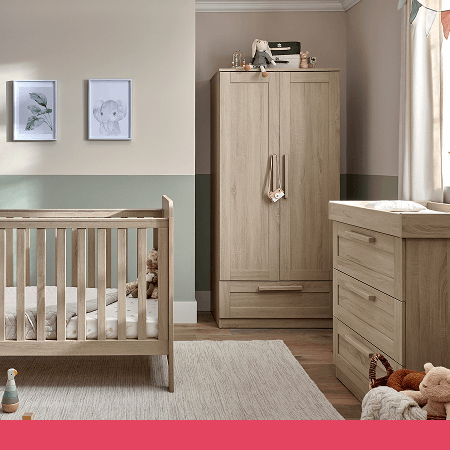 A cozy nursery with a crib, dresser, and wardrobe in neutral tones.