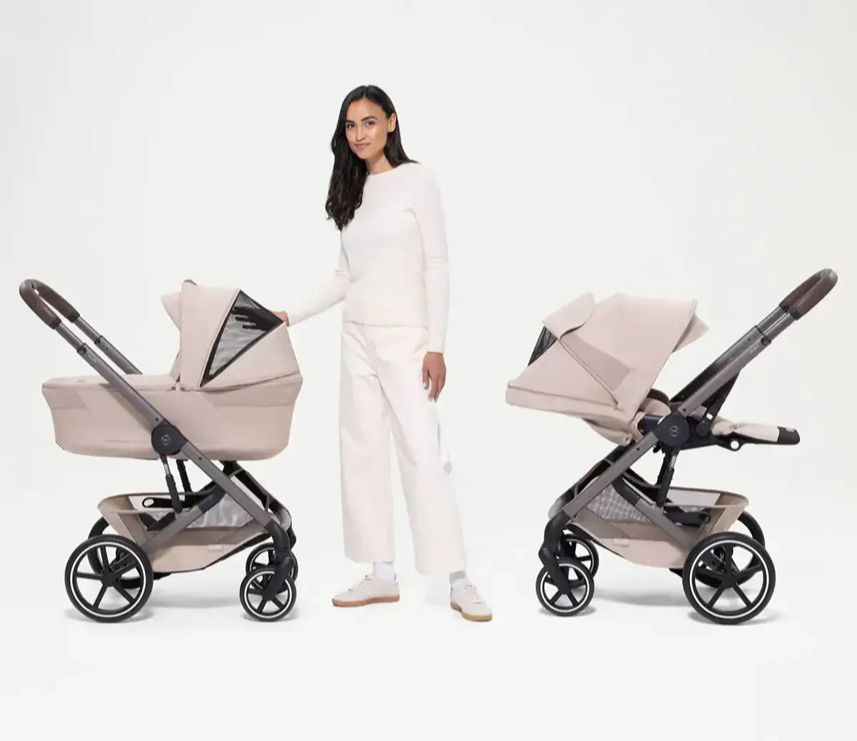 Woman standing in between two Cybex Balios S Lux