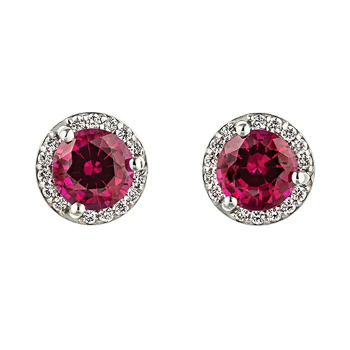 Diamond accented halo ruby earrings in 14k white gold