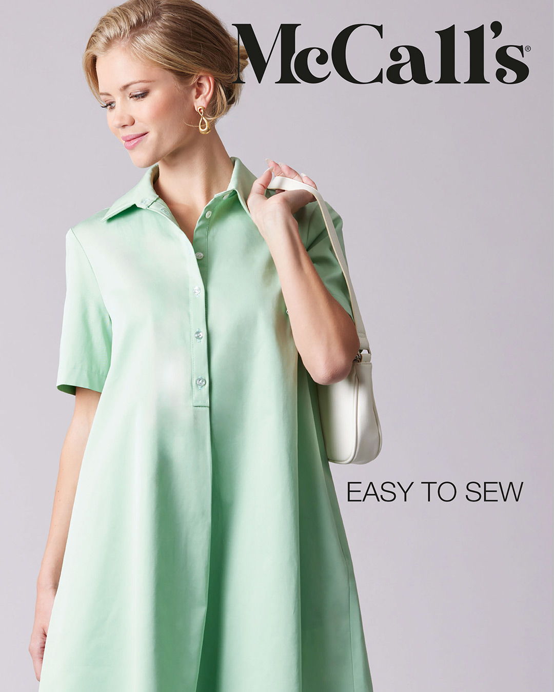 Woman in a green dress with a collar, holding a handbag, promoting McCall's sewing pattern.