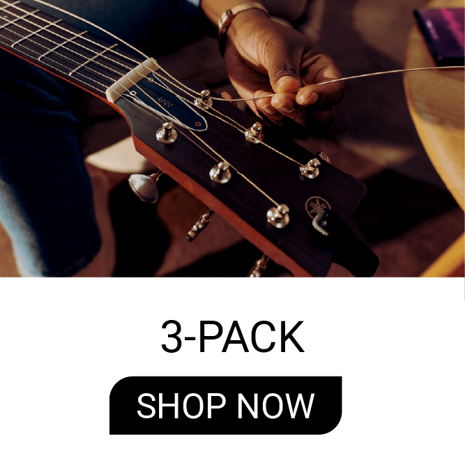 Person tuning a guitar with text: 