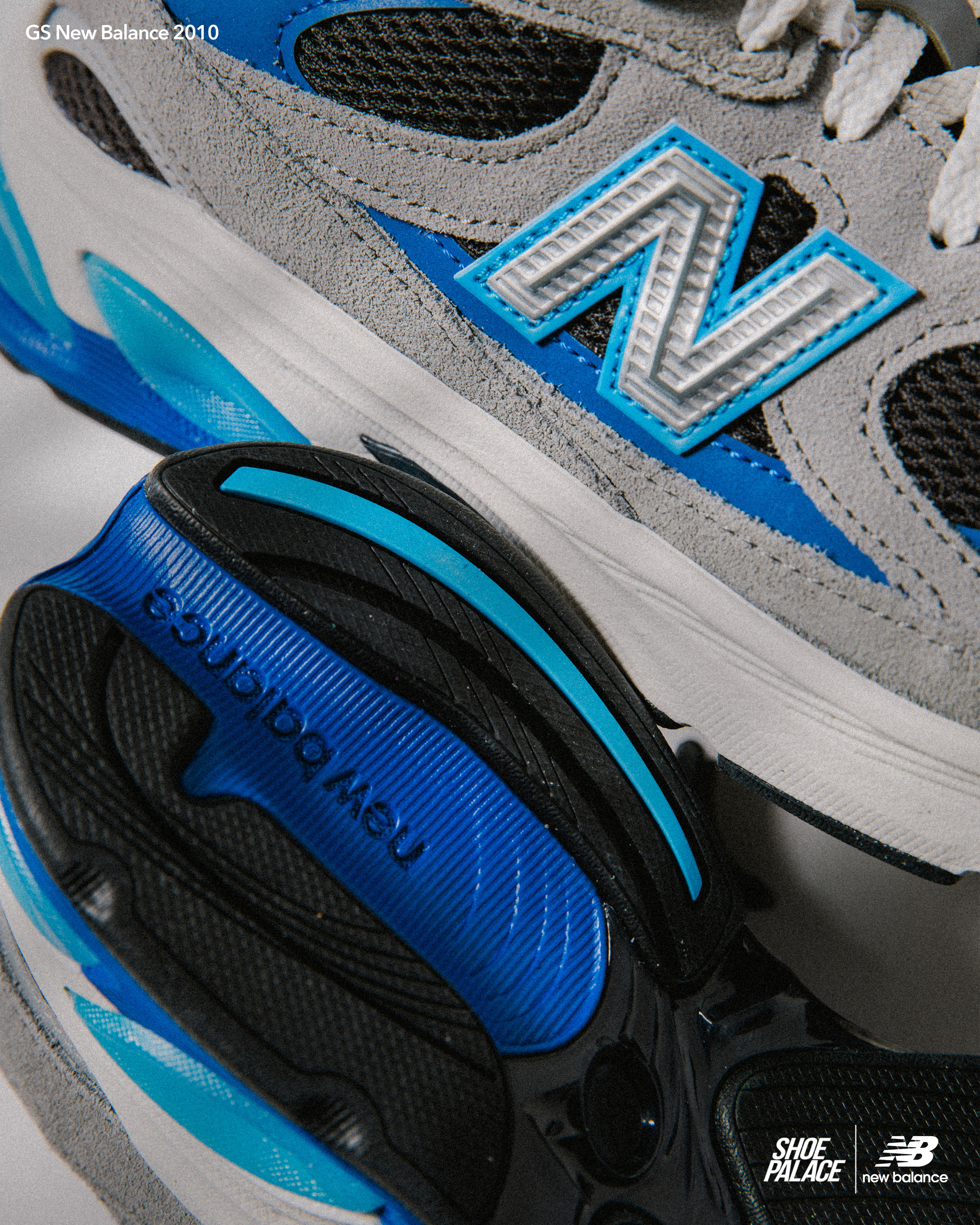 Close-up of New Balance sneakers in gray and blue.