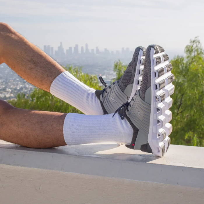 gray on running cloudswift sneakers with la skyline in background