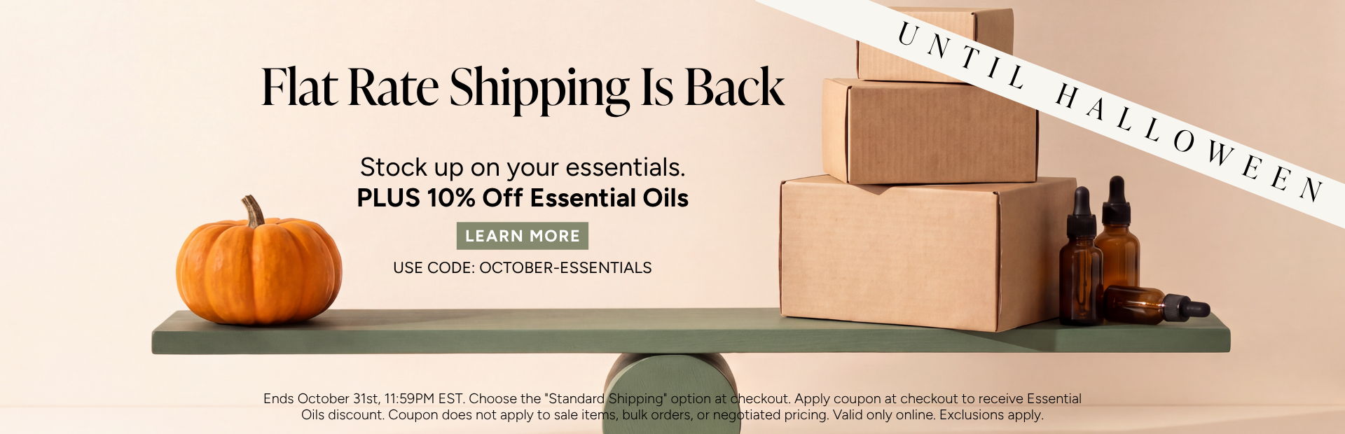 Flat rate shipping promotion with boxes and a pumpkin on a shelf.