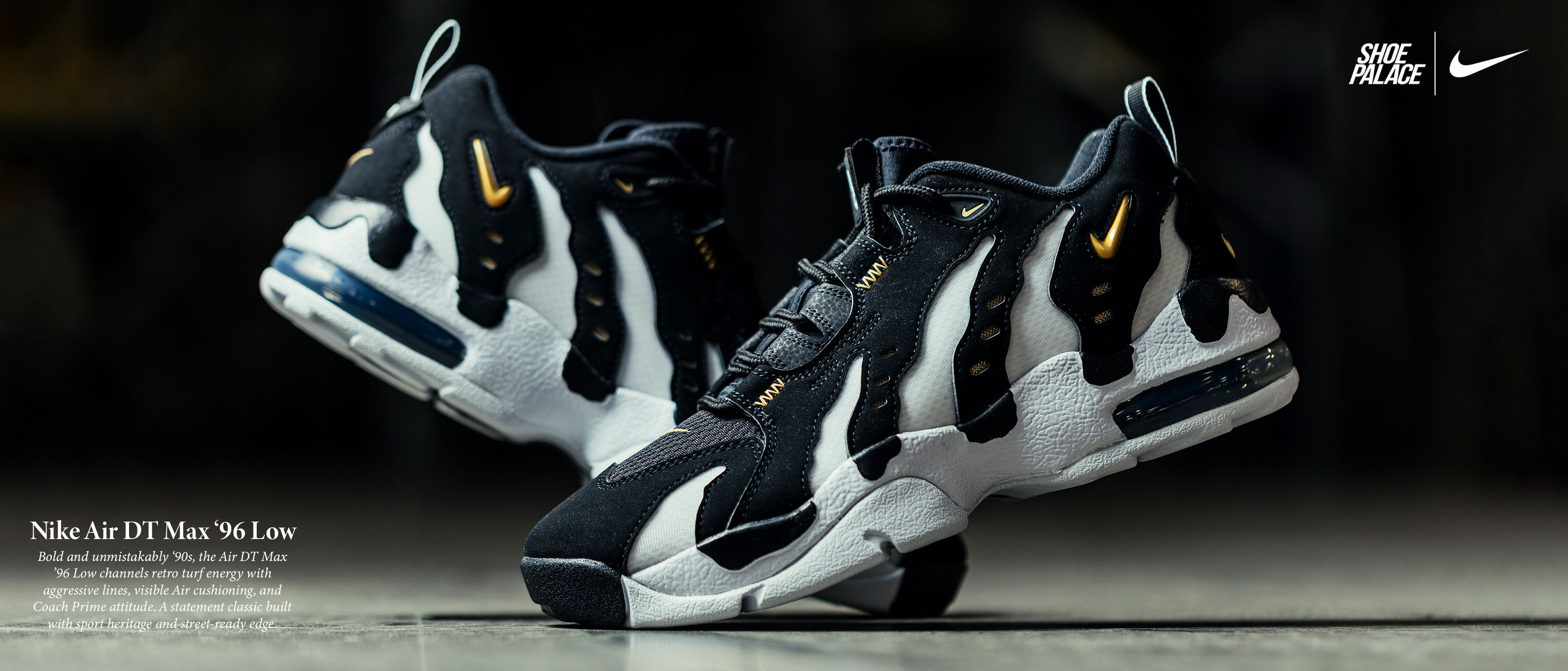 Nike shoes in black and white with yellow accents.