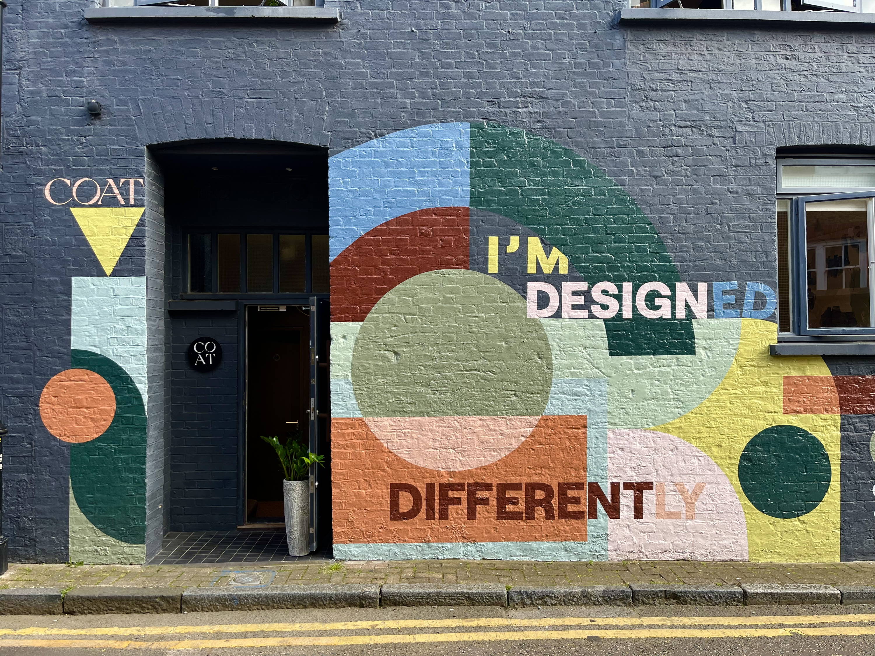 COAT-paint-showroom-office-London-clerkenwell-design-studio-i'm-designed-differently-painted-builsing-wall-mural-shop-front