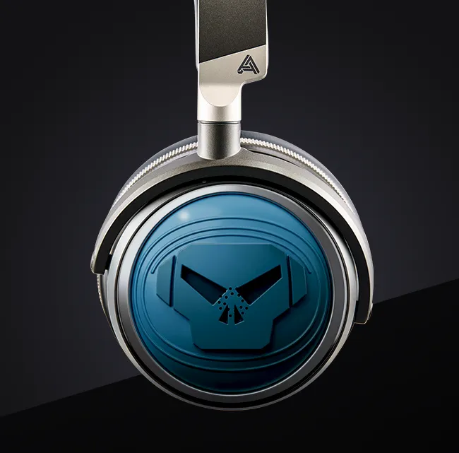 Blue headphone with a skull logo on a black background.