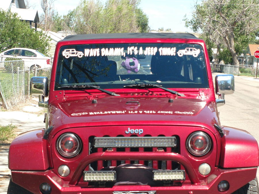 Front view Alvin's 2013 Jeep Rubicon with windshield banner LED light bars and red aftermarket bumper Outlaw train horn install gallery photo 2